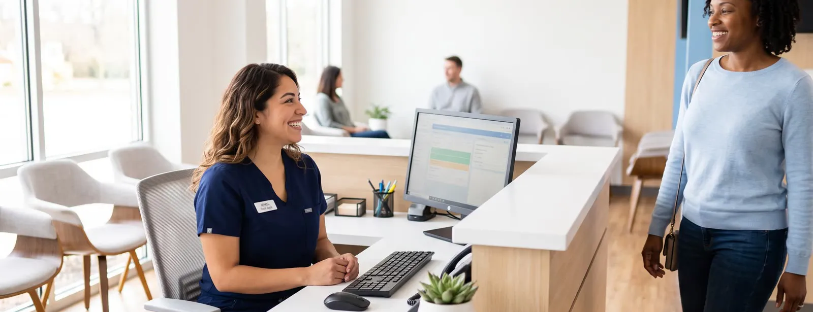 A patient checking in at the front desk
