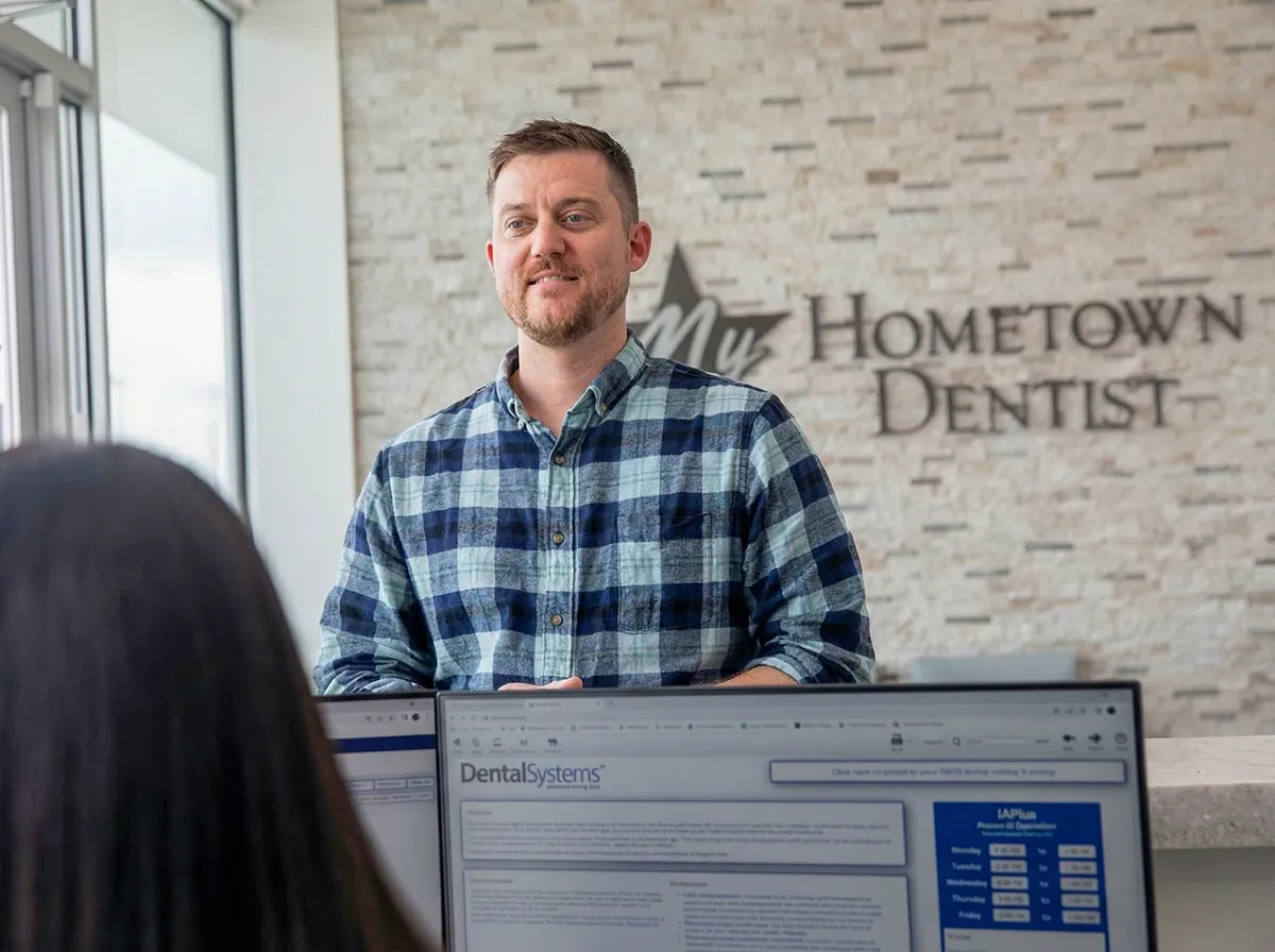 Patient checking in at the front desk